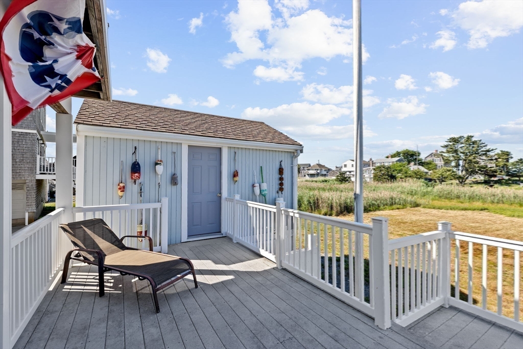 53 Lighthouse Road Scituate, MA 02066 - Photo 15 of 29 a view of a chairs on the roof deck