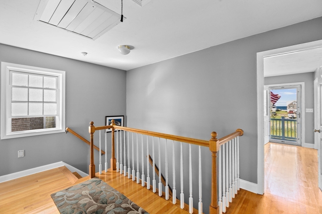 53 Lighthouse Road Scituate, MA 02066 - Photo 17 of 29 a view of a hallway with windows