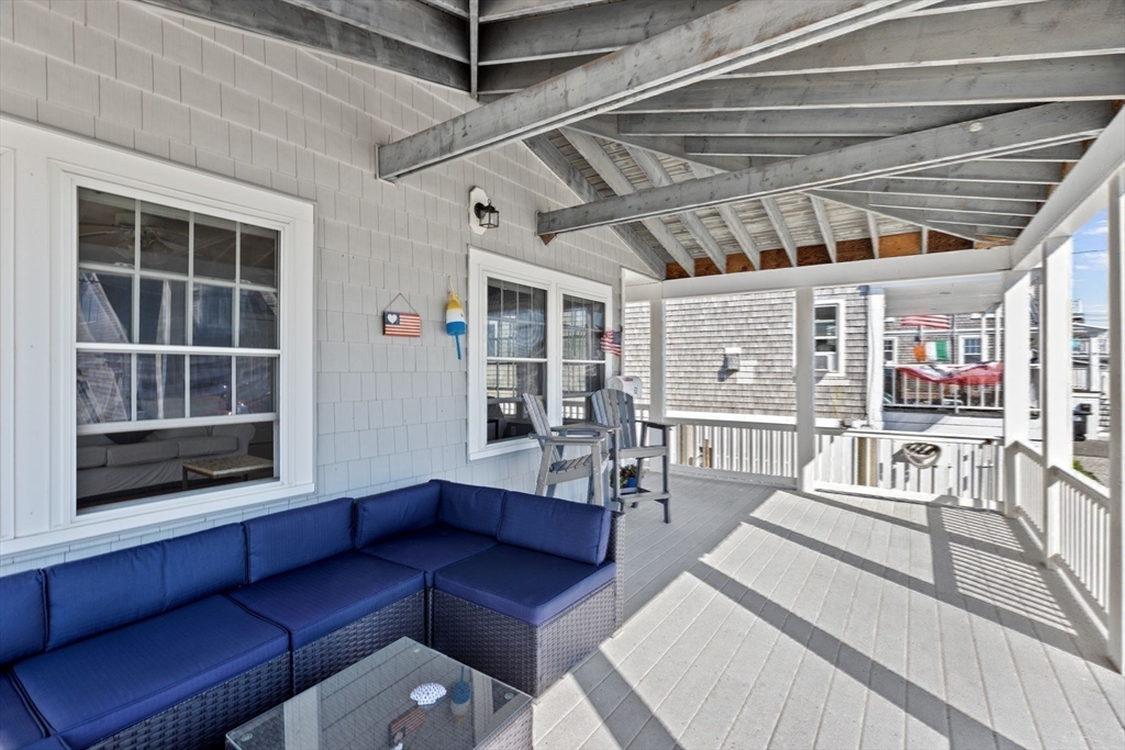 53 Lighthouse Road Scituate, MA 02066 - Photo 7 of 29 a living room with furniture and a large window