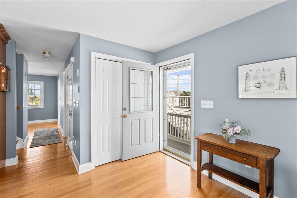 53 Lighthouse Road Scituate, MA 02066 - Photo 8 of 29 a view of a livingroom with a furniture and windows