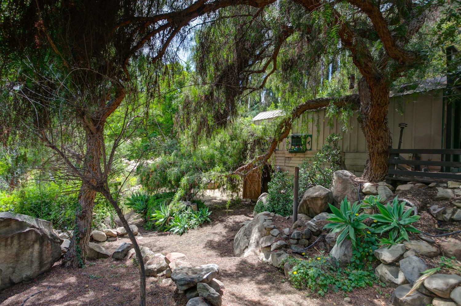 1626 Foothill Road Ojai, CA 93023 - Photo 19 of 31 a backyard of a house with lots of green space