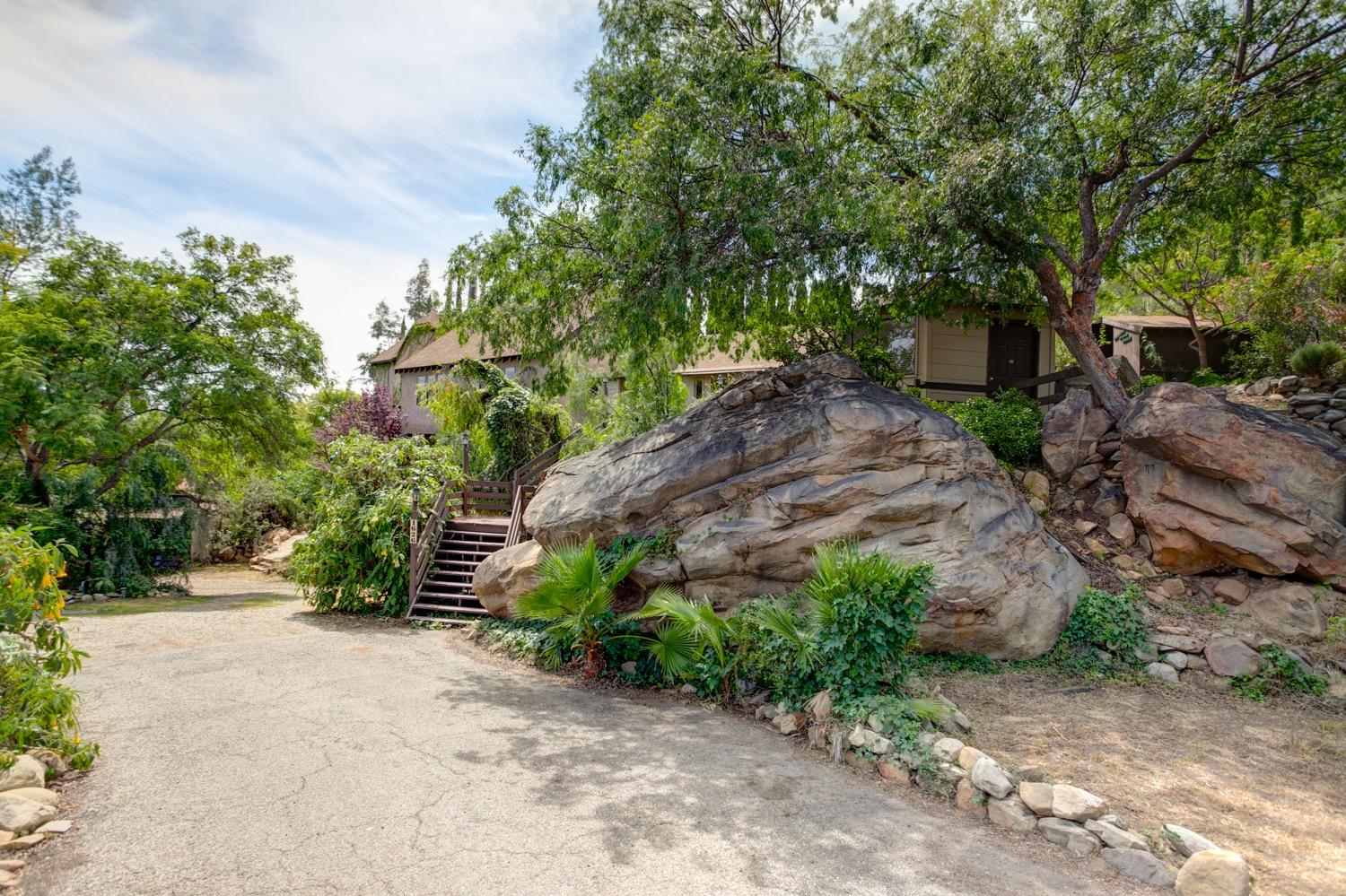 1626 Foothill Road Ojai, CA 93023 - Photo 23 of 31 a backyard of a house with lots of green space