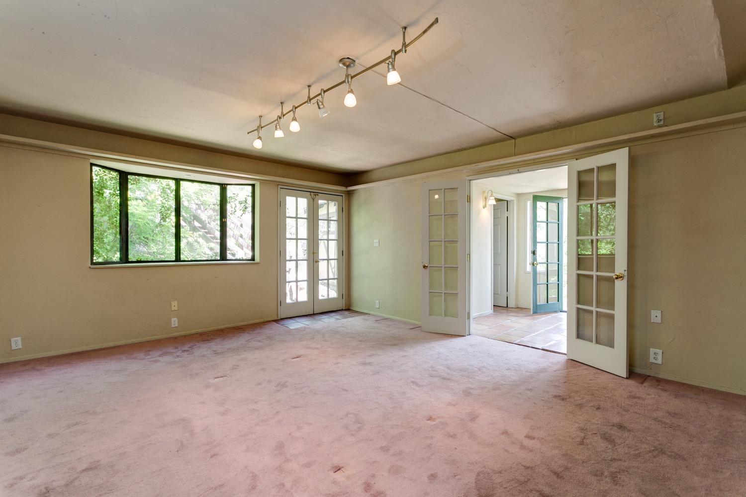 1626 Foothill Road Ojai, CA 93023 - Photo 3 of 31 a view of an empty room with a window and closet area