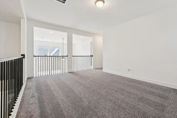 a view of a livingroom with a staircase