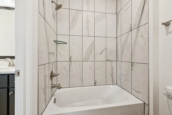 a bathroom with a bathtub