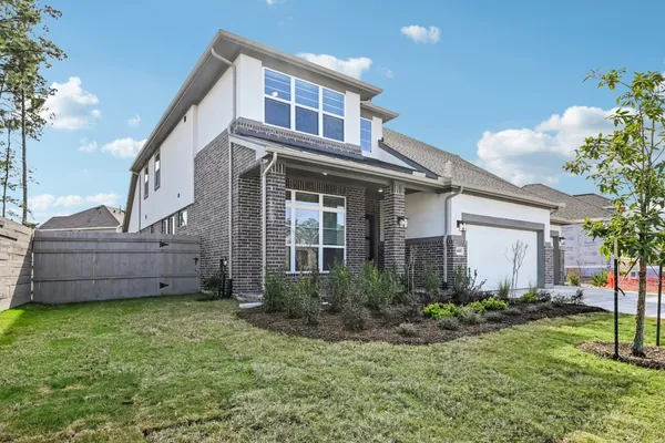 a view of a house with a garden