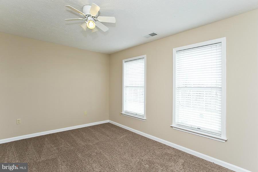 176 White Hall Road Winchester, VA 22603 - Photo 18 of 30 a view of an empty room with a window