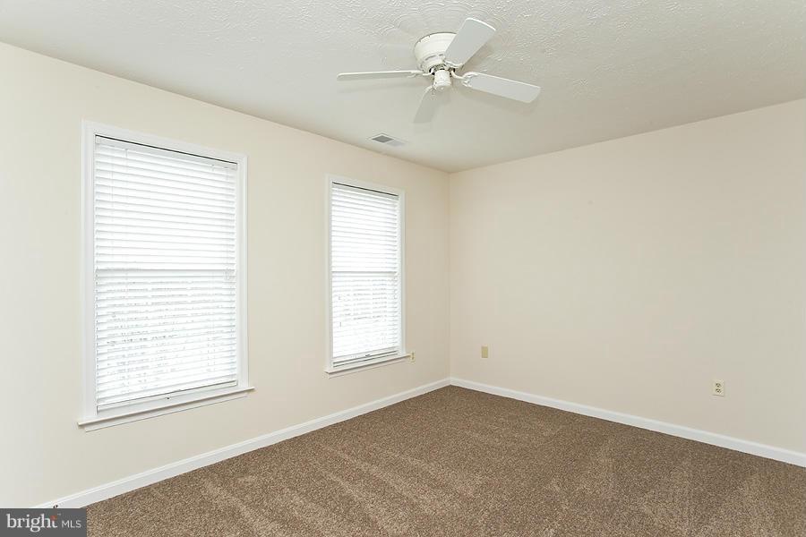 176 White Hall Road Winchester, VA 22603 - Photo 20 of 30 a view of an empty room with a window