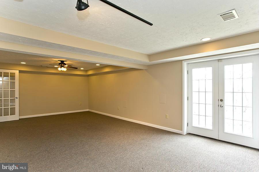 176 White Hall Road Winchester, VA 22603 - Photo 22 of 30 a view of an empty room with a window