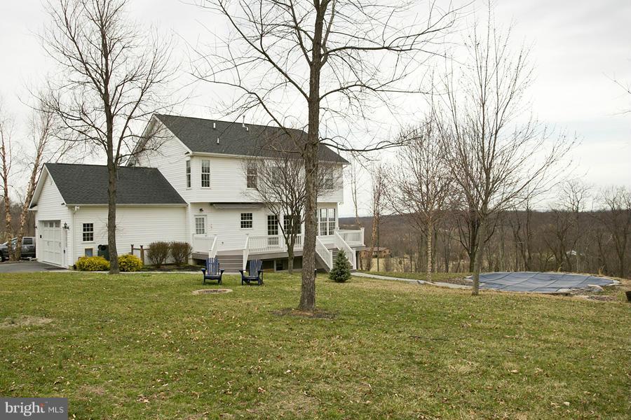 176 White Hall Road Winchester, VA 22603 - Photo 30 of 30 a view of a house with a yard