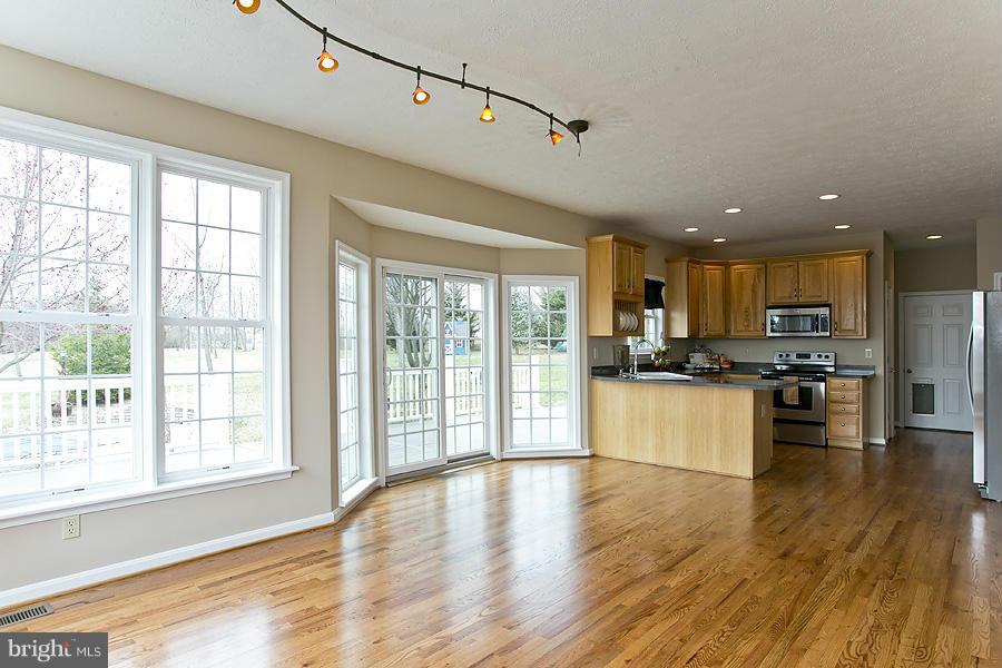 176 White Hall Road Winchester, VA 22603 - Photo 8 of 30 a view of kitchen with wooden floor and electronic appliances
