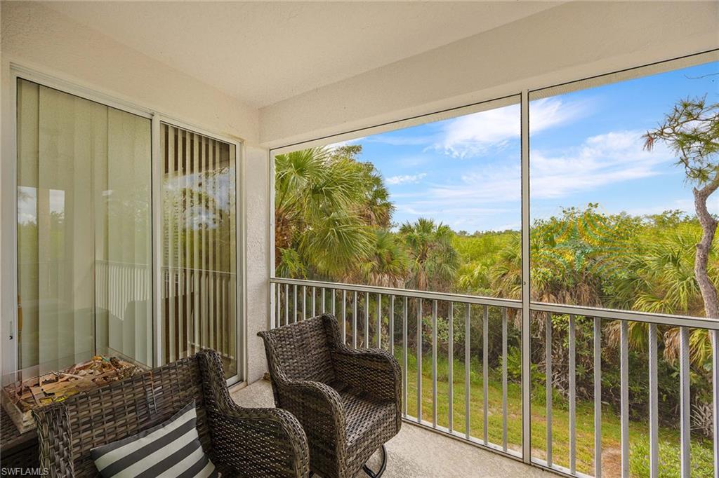 8365 Whisper Trace Way, Unit L204 Naples, FL 34114 - Photo 23 of 45 a balcony with view of city view