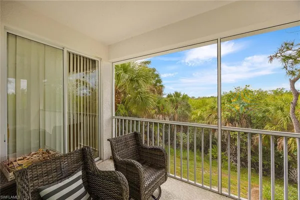 a balcony with view of city view