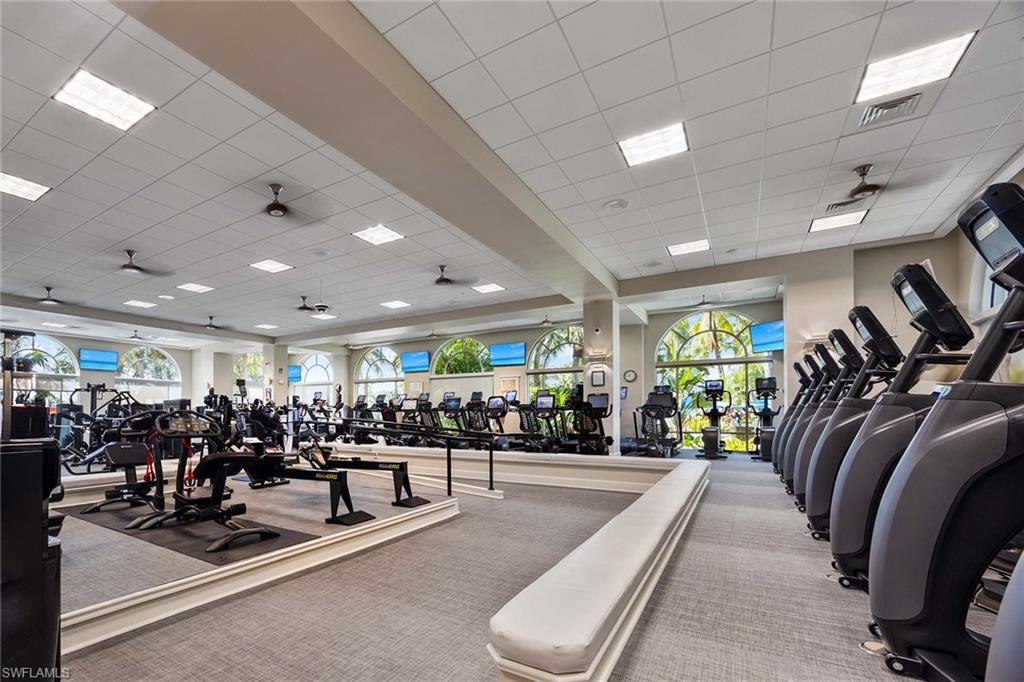8365 Whisper Trace Way, Unit L204 Naples, FL 34114 - Photo 40 of 45 a view of a room with gym equipment