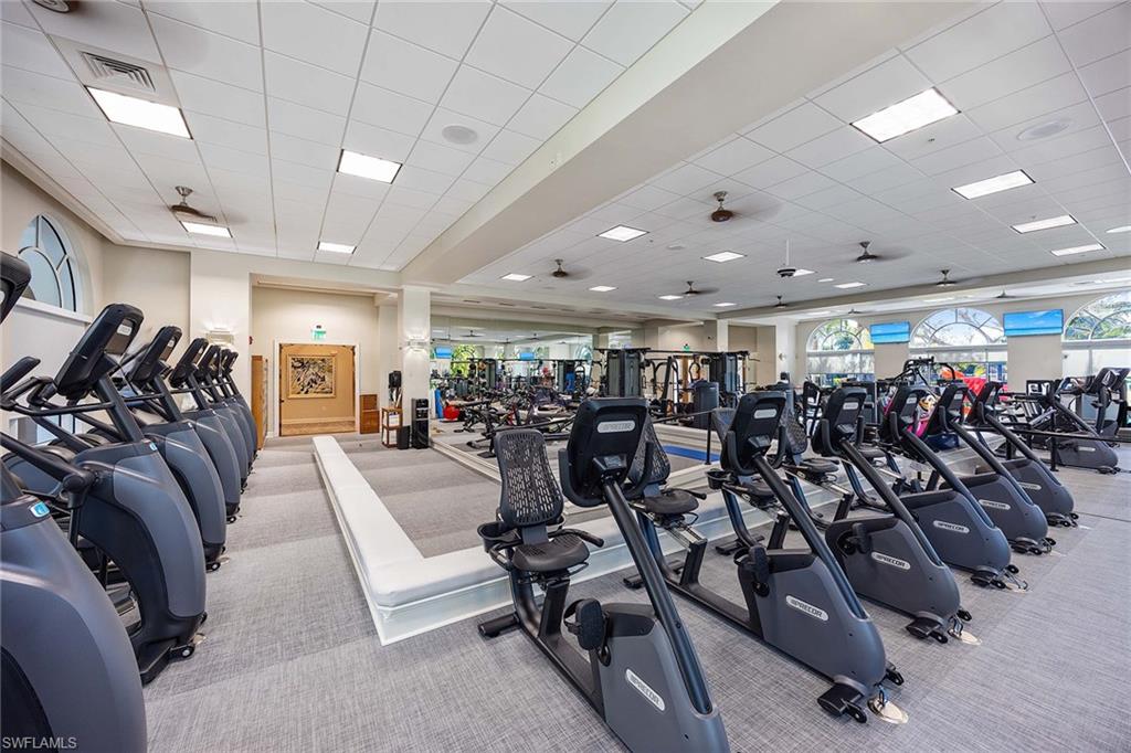 8365 Whisper Trace Way, Unit L204 Naples, FL 34114 - Photo 40 of 45 a view of a room with gym equipment