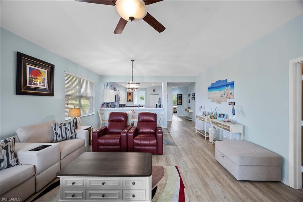 8365 Whisper Trace Way, Unit L204 Naples, FL 34114 - Photo 8 of 45 a living room with furniture