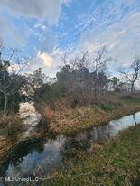 1-5 Mallard Street Bay St. Louis, MS 39520 - Photo 3 of 15 328859751_3454653764753382_7805101556051