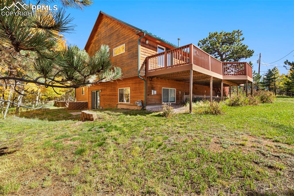 162 Ridge Top Drive Divide, CO 80814 - Photo 32 of 50 a view of a house with a yard