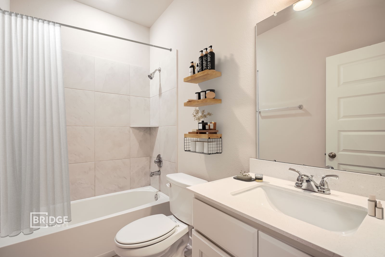 371 Huisache Street Lake Jackson, TX 77566 - Photo 6 of 10 a bathroom with a sink a toilet and a bathtub