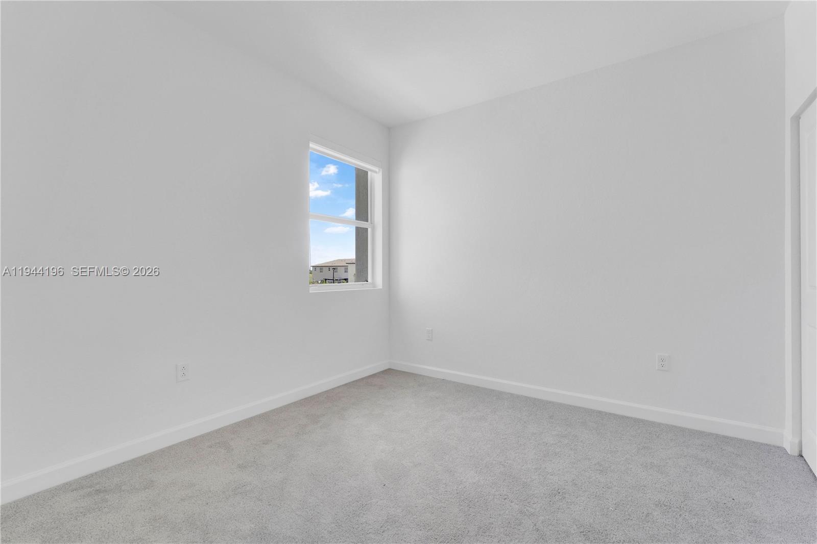 12168 Southwest 268th Street Homestead, FL 33032 - Photo 12 of 27 a view of empty room