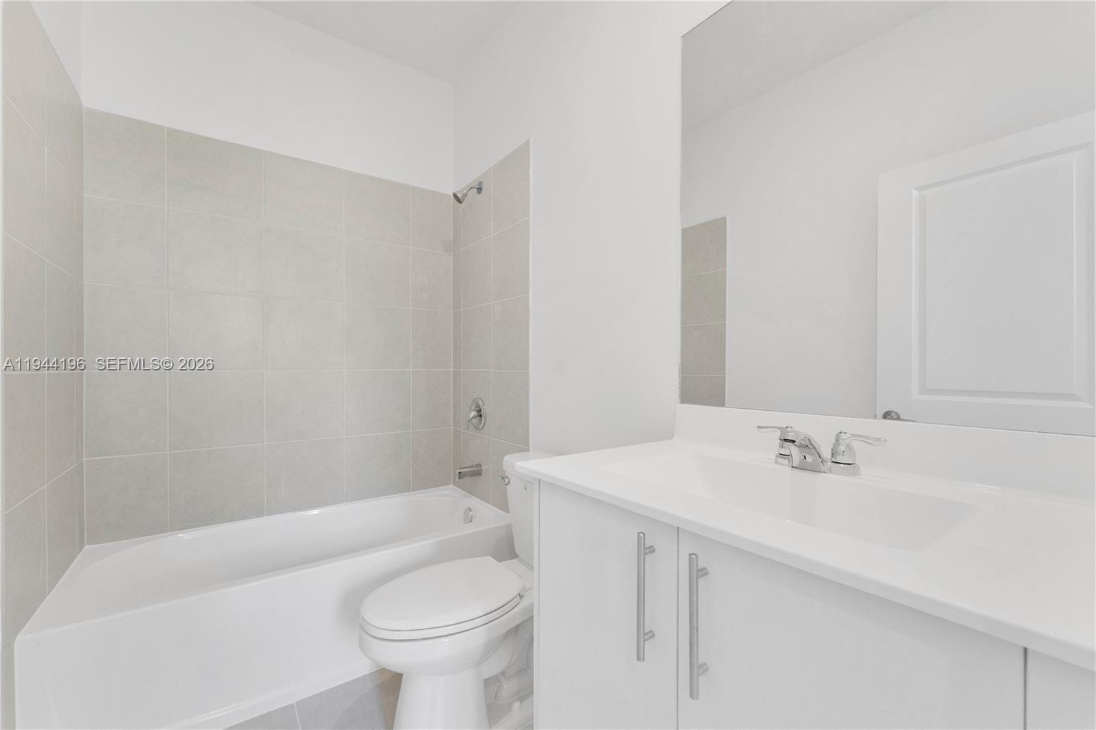 12168 Southwest 268th Street Homestead, FL 33032 - Photo 13 of 27 a bathroom with a sink a toilet and shower