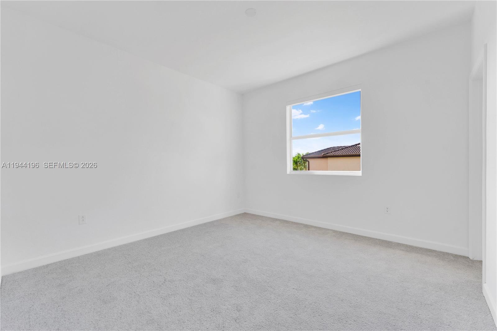 12168 Southwest 268th Street Homestead, FL 33032 - Photo 14 of 27 a view of an empty room