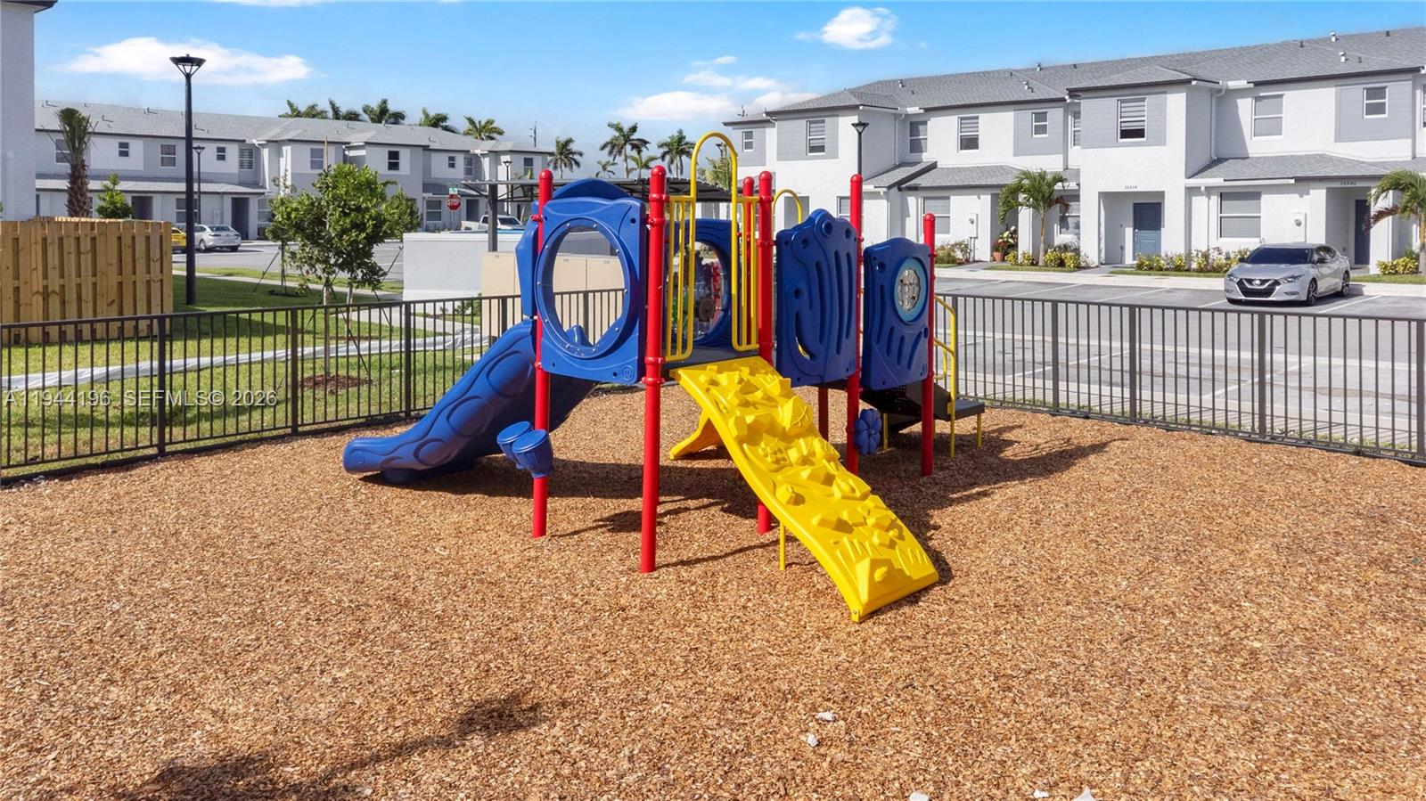 12168 Southwest 268th Street Homestead, FL 33032 - Photo 22 of 27 a view of a park with swings