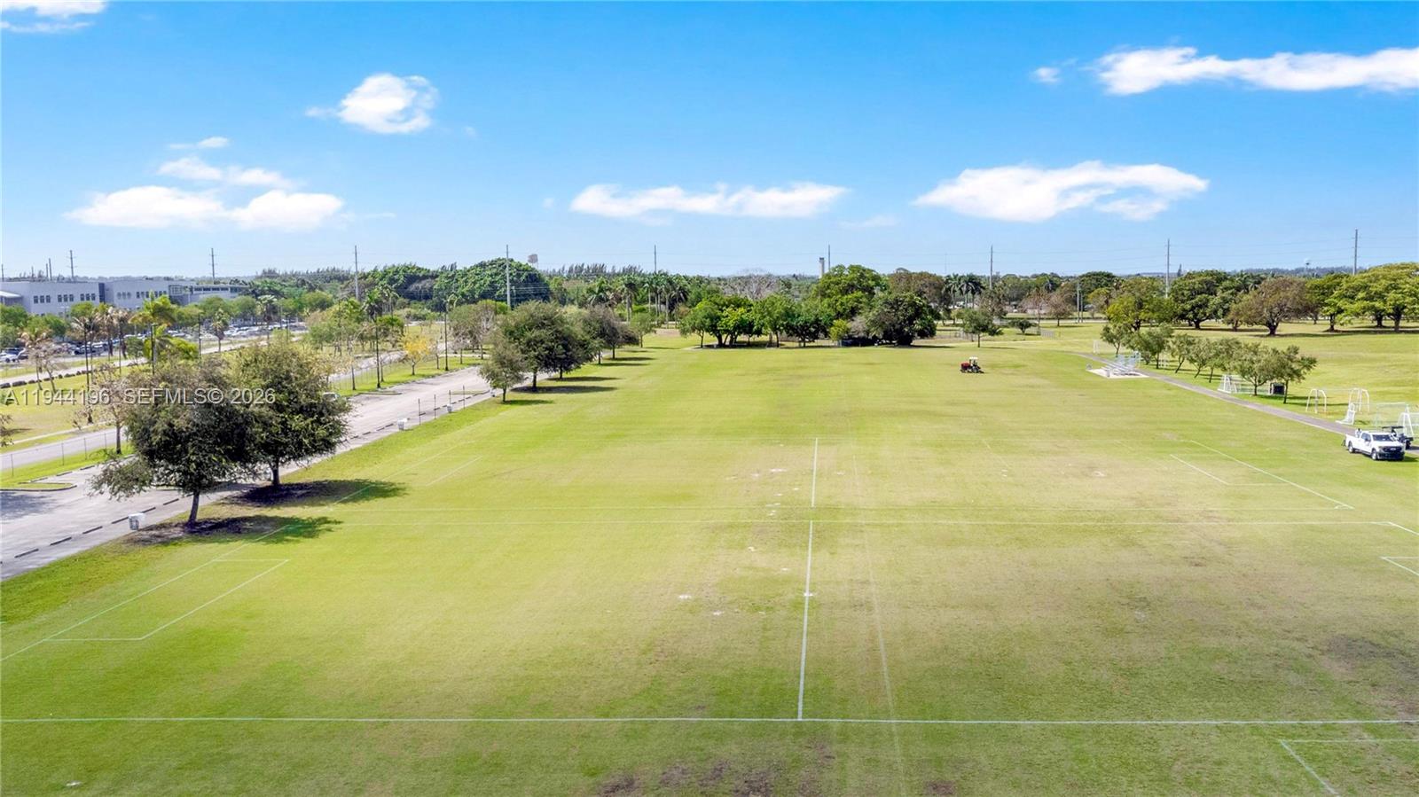 12168 Southwest 268th Street Homestead, FL 33032 - Photo 24 of 27 a view of a lake and a houses
