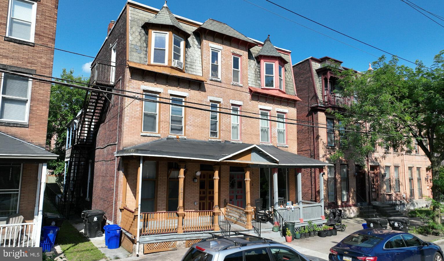 a view of a building with a street