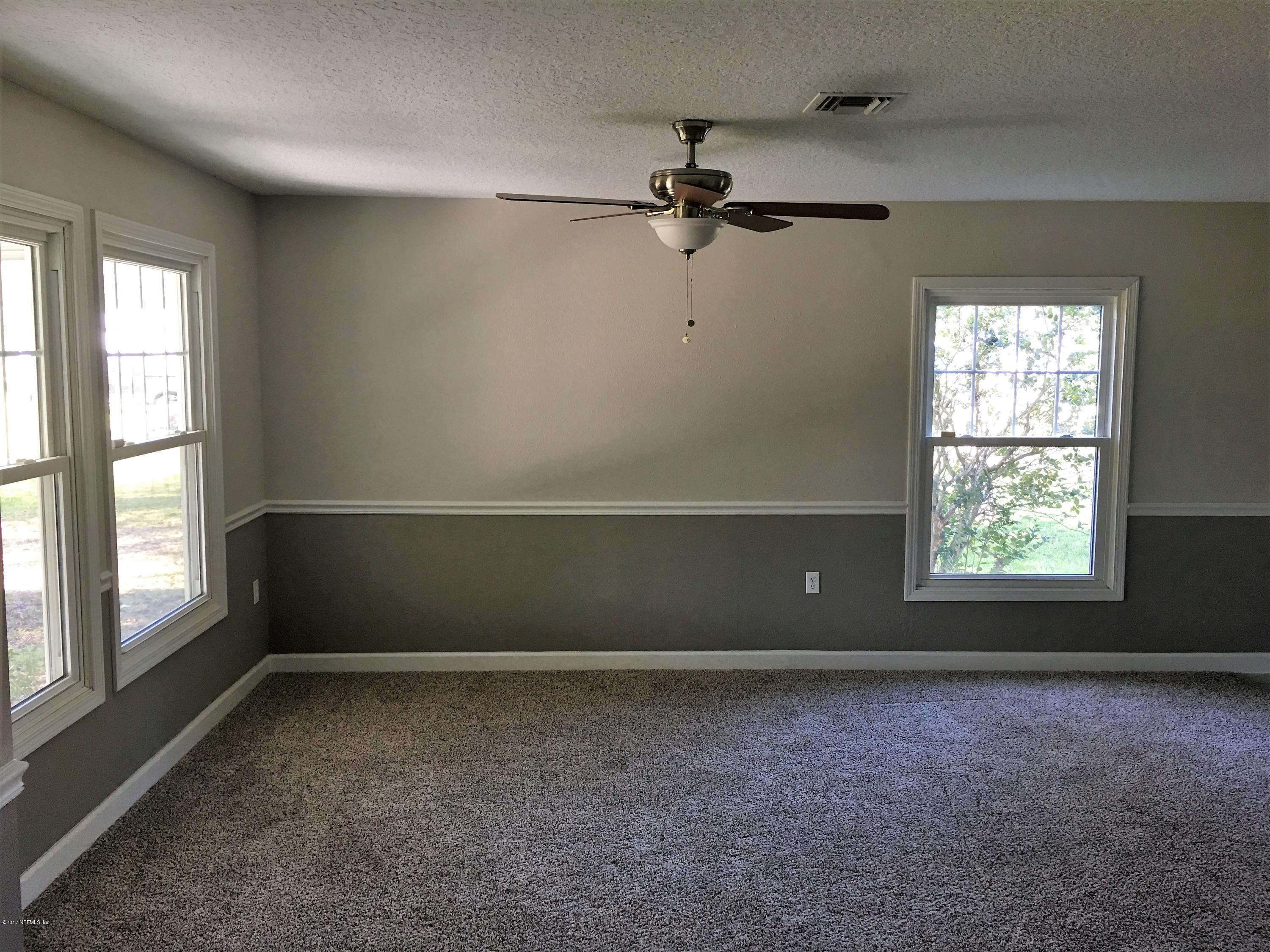 43663 Ratliff Road Callahan, FL 32011 - Photo 12 of 36 an empty room with a window