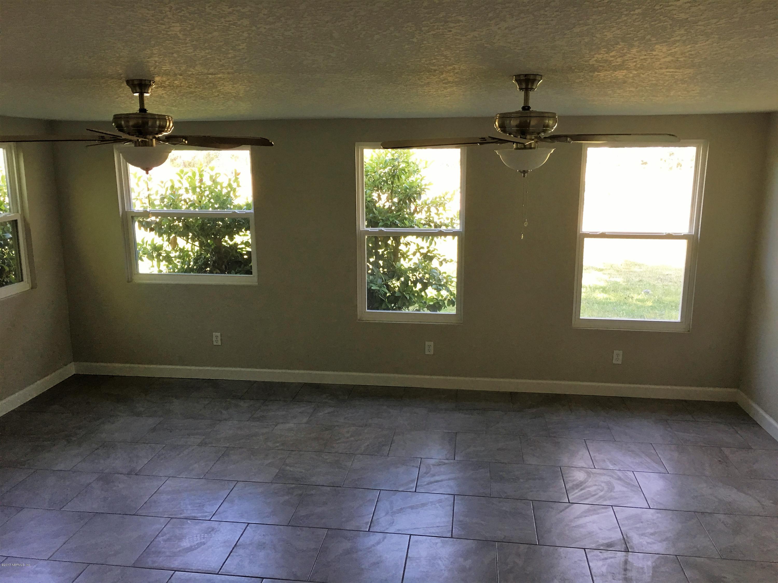 43663 Ratliff Road Callahan, FL 32011 - Photo 17 of 36 a view of an empty room and window