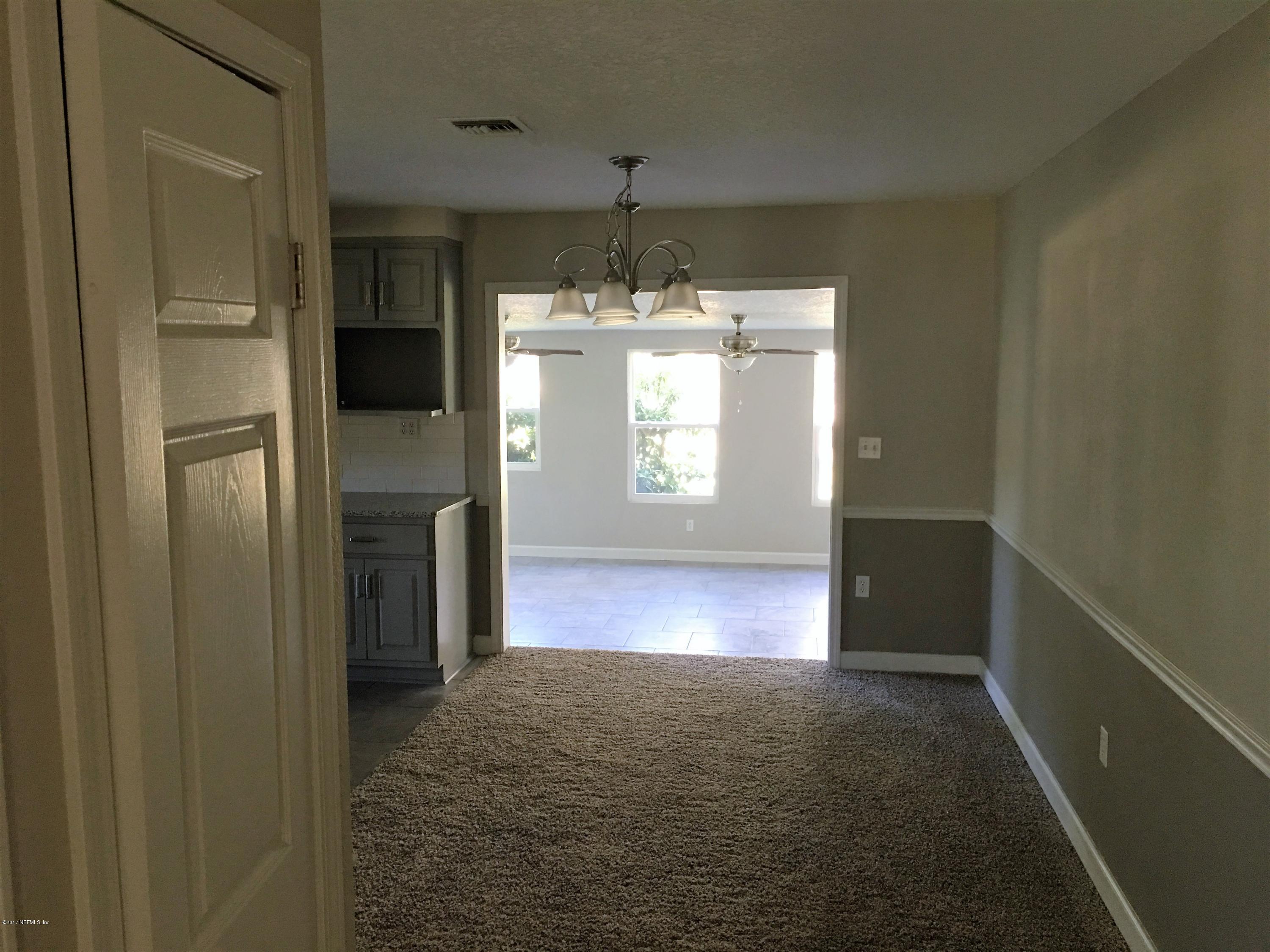 43663 Ratliff Road Callahan, FL 32011 - Photo 20 of 36 a view of livingroom with window