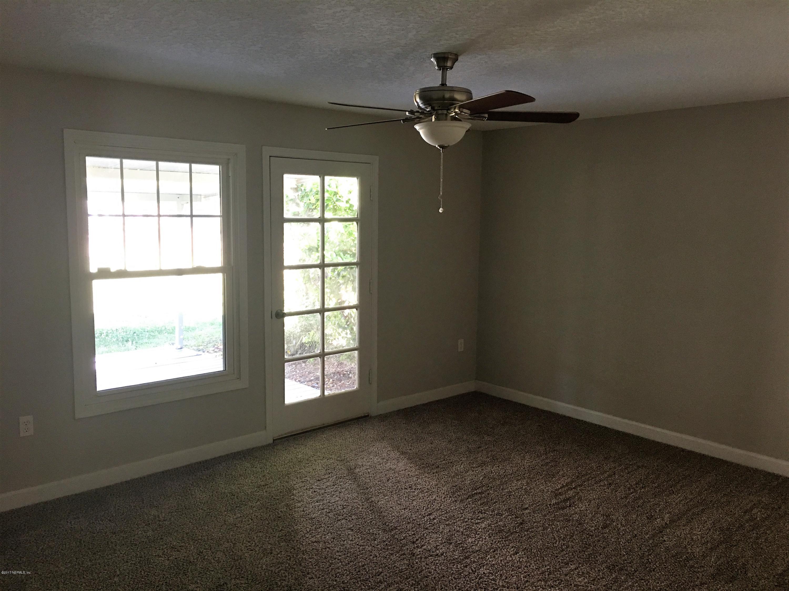43663 Ratliff Road Callahan, FL 32011 - Photo 28 of 36 an empty room with a window