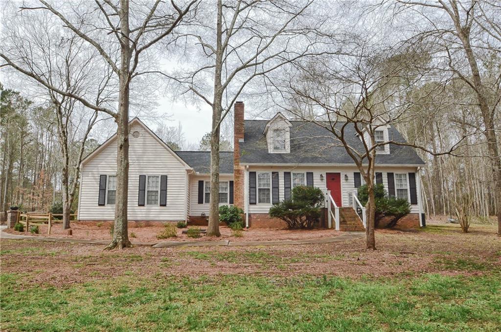 5842 Waterworks Road Nicholson, GA 30565 - Photo 1 of 1 a front view of a house with garden