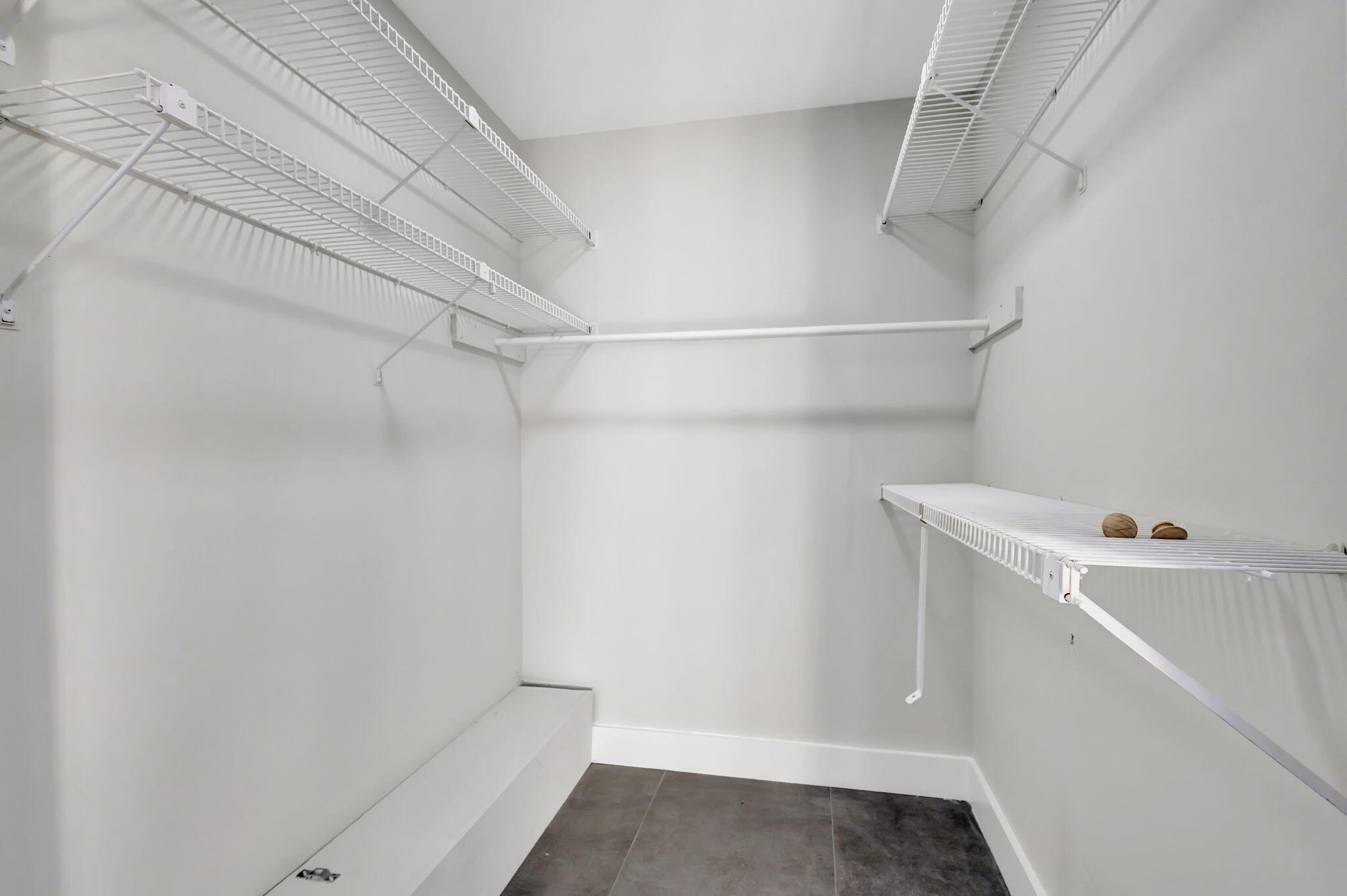 318 3rd Way West Palm Beach, FL 33407 - Photo 16 of 26 a view of storage and utility room with racks on the wall