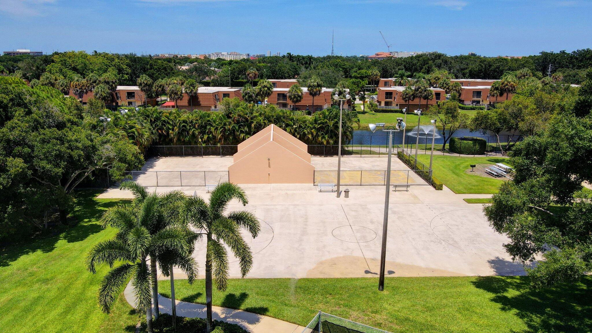 318 3rd Way West Palm Beach, FL 33407 - Photo 26 of 26 an aerial view of a house with a garden and swimming pool