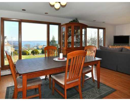 40 Robin Road Portsmouth, RI 02871 - Photo 2 of 12 Dining Room. The Dining Area and Living Room feature 2 large picture windows that look out onto the Sakonnet River - gorgeous sunrises!