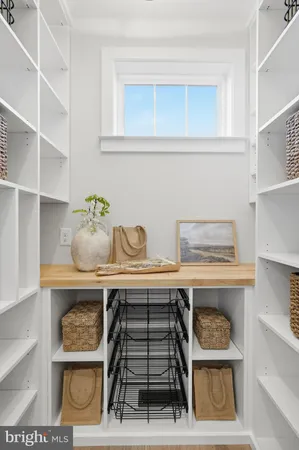 a kitchen with a stove and cabinets