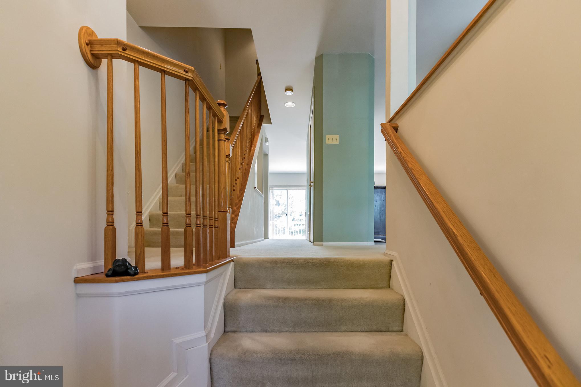 6118 Good Hunters Ride Columbia, MD 21045 - Photo 14 of 24 a view of staircase with railing and white walls