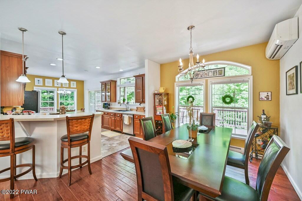 131 Anderson Road Lake Ariel, PA 18436 - Photo 7 of 47 a view of a dining room with furniture window and wooden floor