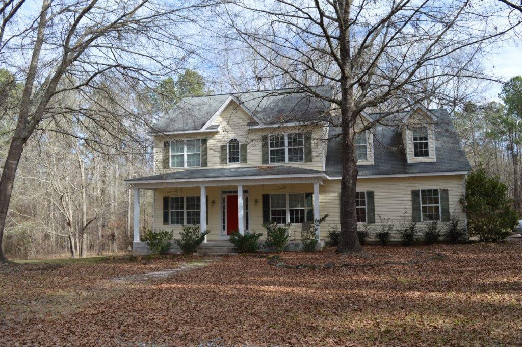 163 Oliver Greene Road Gray, GA 31032 - Photo 1 of 19 a front view of a house with a yard