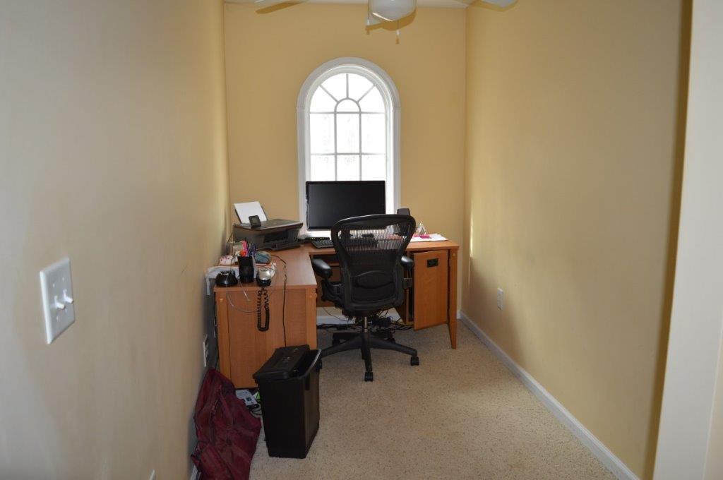 163 Oliver Greene Road Gray, GA 31032 - Photo 14 of 19 a view of a workspace with a window