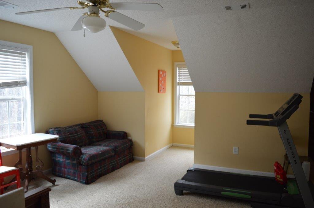 163 Oliver Greene Road Gray, GA 31032 - Photo 15 of 19 a living room with furniture and a window