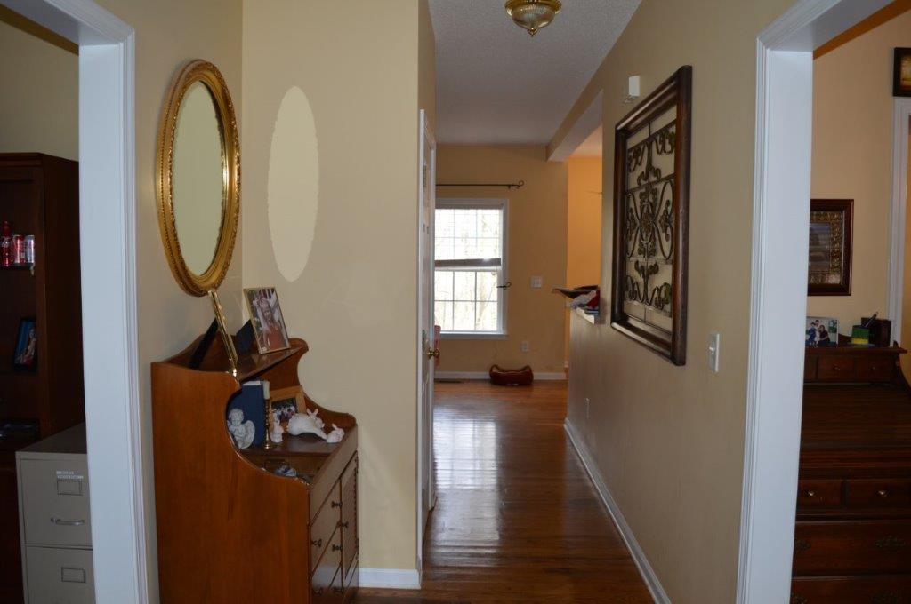 163 Oliver Greene Road Gray, GA 31032 - Photo 10 of 19 a view of a entryway door with wooden floor