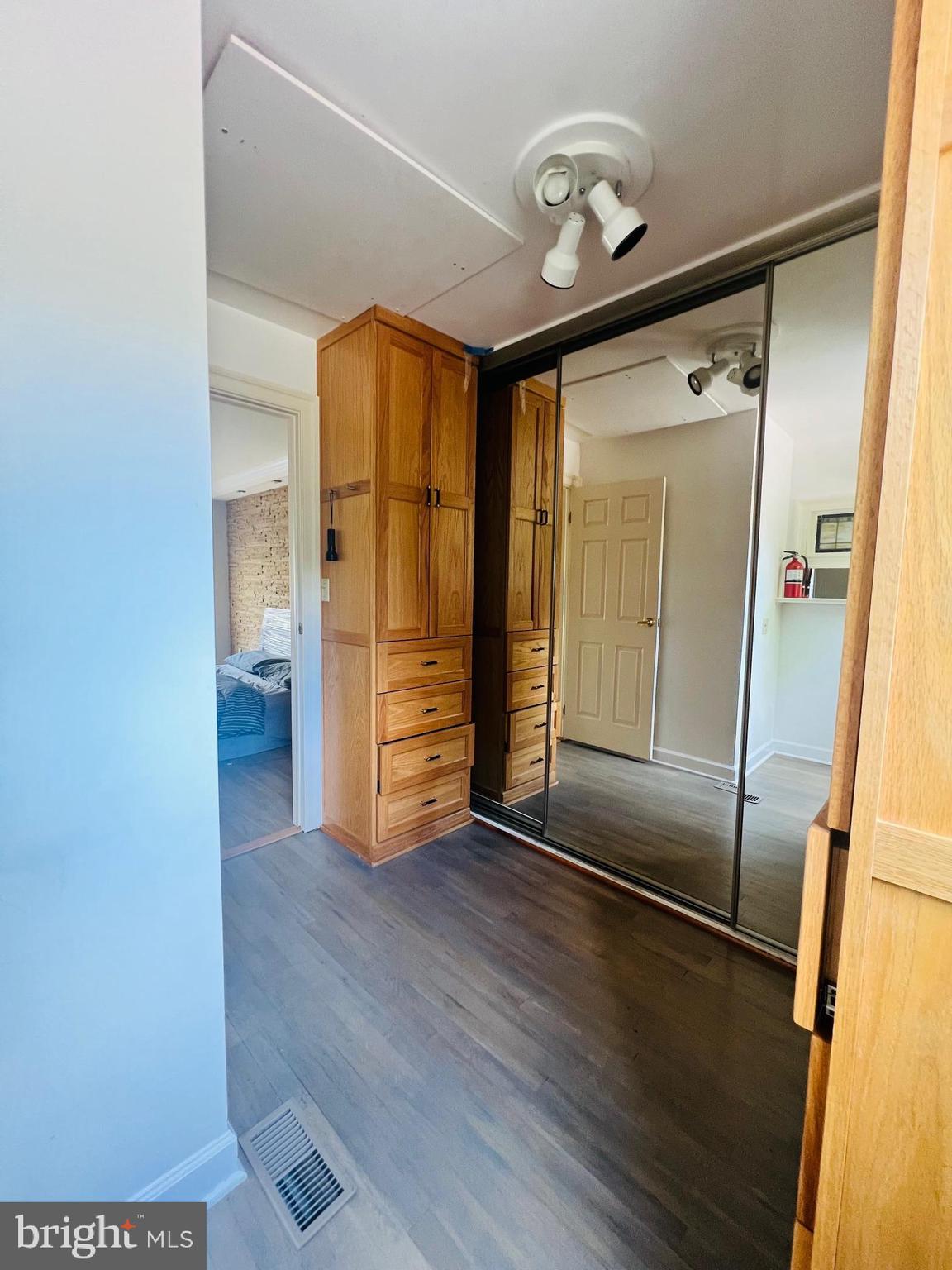 15729 Holly Grove Road Silver Spring, MD 20905 - Photo 24 of 37 Primary bedroom walk-in closet