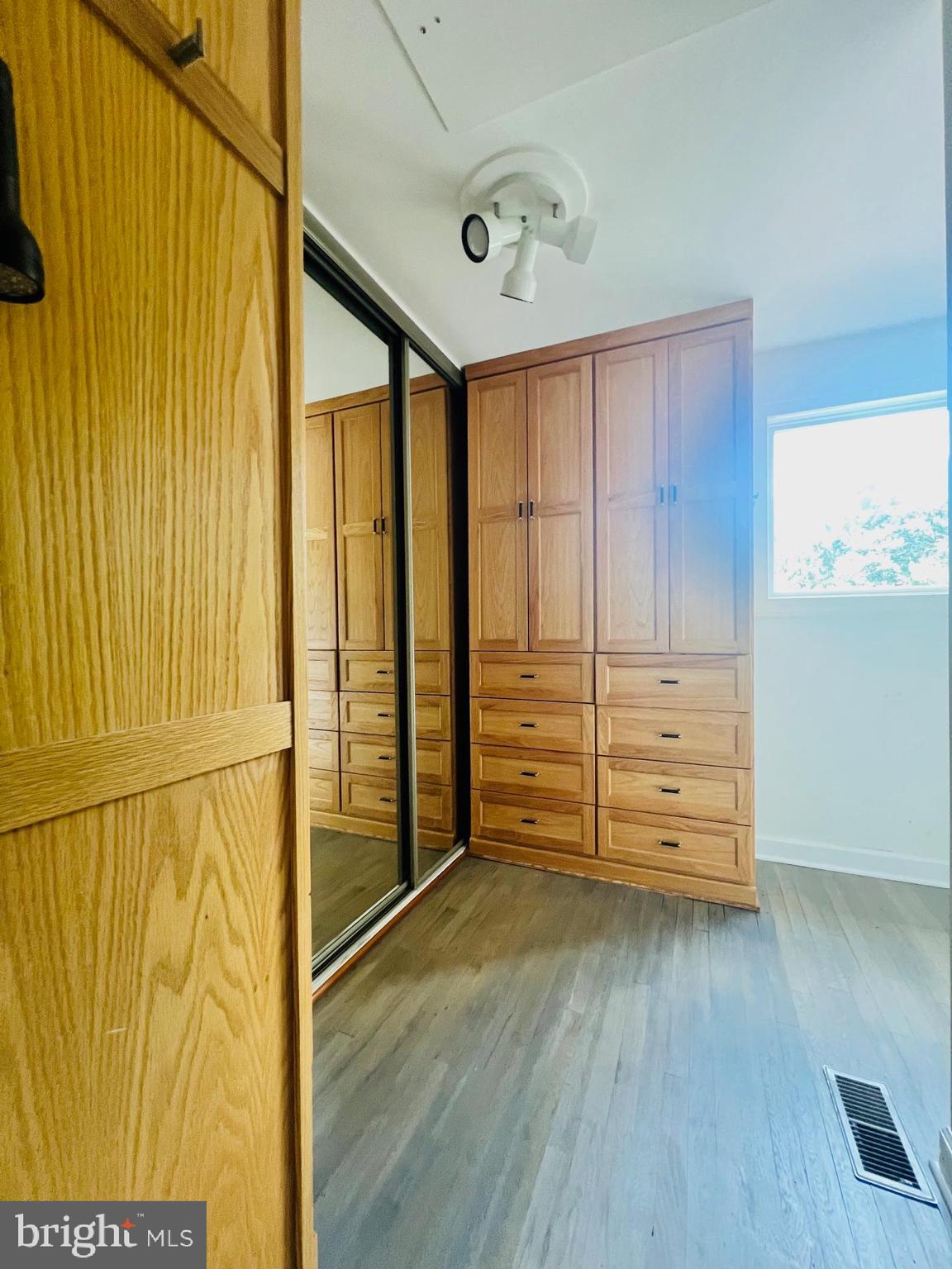 15729 Holly Grove Road Silver Spring, MD 20905 - Photo 25 of 37 Primary bedroom walk-in closet