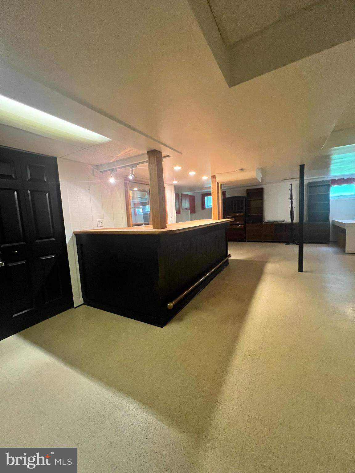 15729 Holly Grove Road Silver Spring, MD 20905 - Photo 35 of 37 Bar area in basement