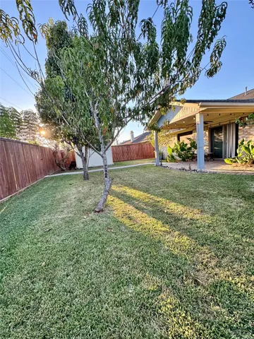 a view of swimming pool with a backyard