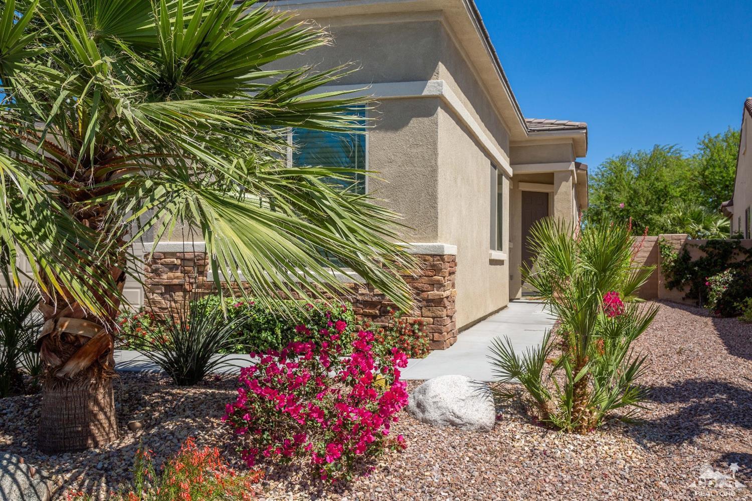 81340 Corte Compras Indio, CA 92203 - Photo 2 of 43 a front view of a house with a yard