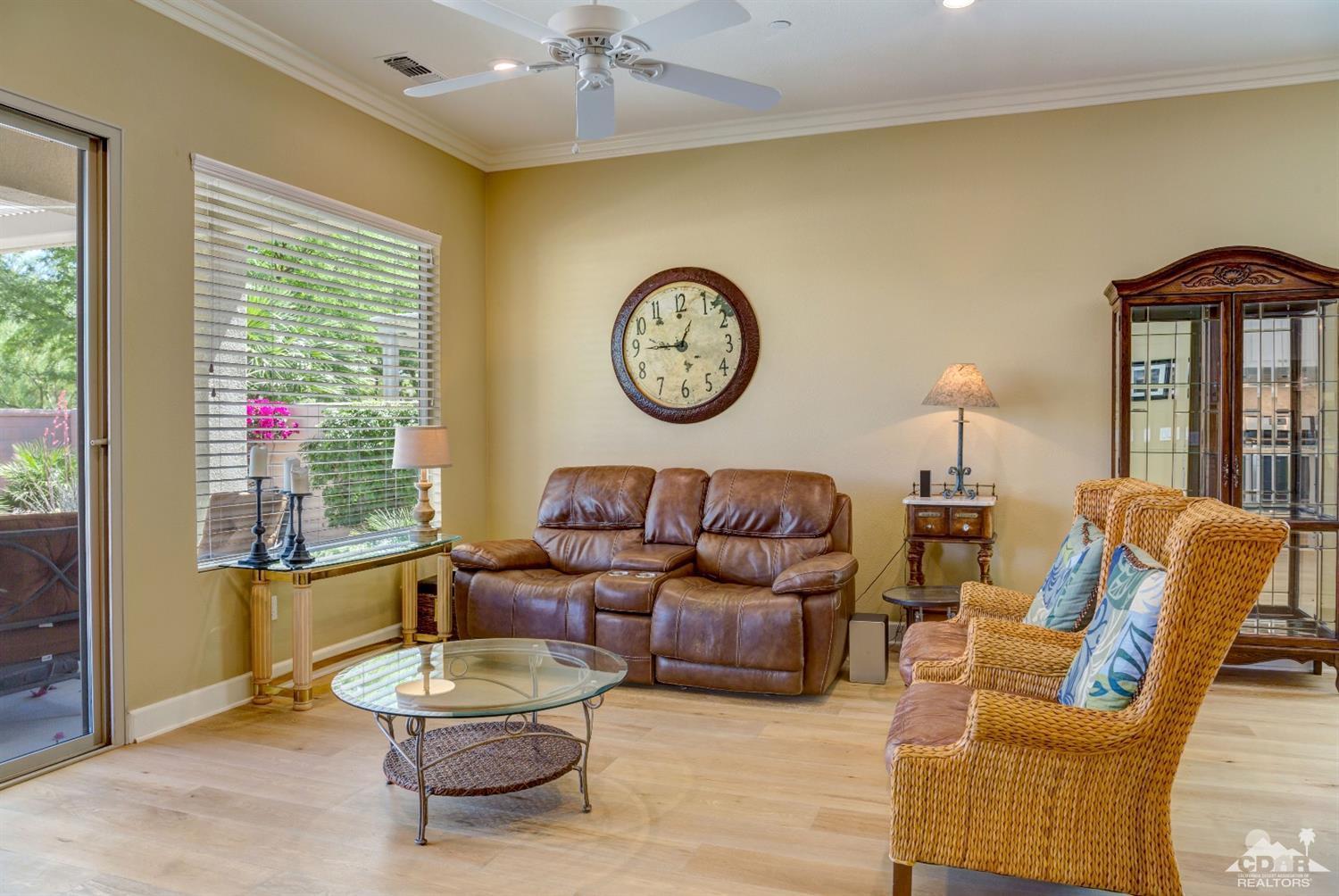 81340 Corte Compras Indio, CA 92203 - Photo 4 of 43 a living room with furniture a table and a large window
